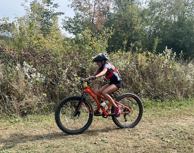 Jamie-Lynn's daughter Anjali on the mountain bike, competing in her first race.