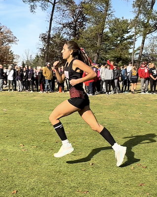 Jamie-Lynn's older daughter - Maya running for cross-country team at the State competition. 