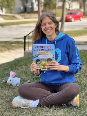 Jamie-Lynn with the workbook and easter bunny Jamie-Lynn with the workbook and Easter bunny.