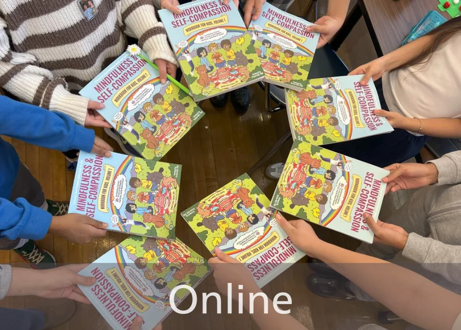 Overlay Workbooks with kids hands A teacher and a student give each other a high-five; ; the word "Online" is at the bottom of the im