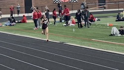 Maya competing in Wisconsin State Track Competition.